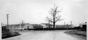 From west side of pavement on El Monte Boulevard looking south across Main Street and P.E. property desired for street purposes, Los Angeles County, 1927