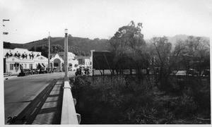 On L.A. River bridge, Universal City, looking southeasterly to advertising sign, Los Angeles, 1928