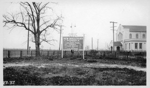 Looking easterly into corner desired for highway connection. Men are standing on curb line proposed in P.E. plan, Los Angeles County, 1927