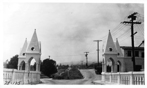 Looking west on Franklin Avenue from bridge over arroyo east of Talmadge Street showing center parking in double roadway, Los Angeles, 1928