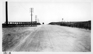 Photograph showing encroachment of guard rail fence at entrance to the Hill Crest Country Club on Pico Boulevard, Los Angeles, 1923