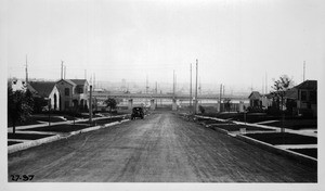 Viaduct over Pico Boulevard at San Vicente from point in center of Tremaine Street north of Pico Boulevard looking south at P.E. viaduct over Pico Street