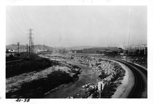 View looking north along Los Angeles River from Macy Street bridge, Los Angeles, 1940