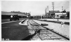 Grade crossing of North Spring Street over Southern Pacific tracks near Elmyra Street, Los Angeles, 1928