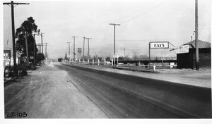 From point on west side of Downey Road south of crossing looking north showing location of structure in reference to present grade crossing, Los Angeles, 1927