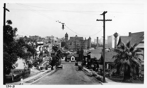 Photograph taken at the head of 5th Street on Fremont looking east, showing possibilities of extending 5th Street thru to Olive Street, Los Angeles, 1922