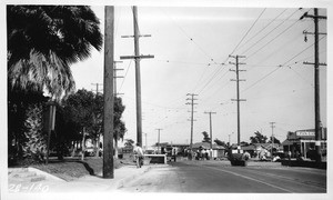 Venice Boulevard looking easterly from 7th Avenue showing protection of north entrance to subway into Venice Boulevard, Los Angeles, 1928