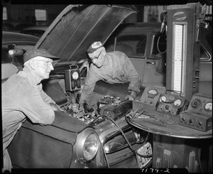 40-year old garage closing to make way for freeway, Los Angeles, 1958