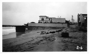 Looking north from foot of 64th Avenue showing erosion around house formerly owned by Mae Murray, Los Angeles County, 1940