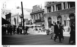 Corner of 8th & Hill showing obstruction on west side of Hill Street by reason of Telephone Company's excavation, Los Angeles, 1923