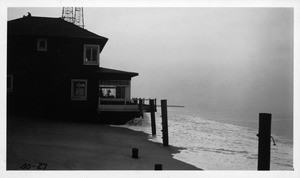 Looking southwest from foot of 37th Avenue showing sea at base of house 1 1/2 hours after high tide, Los Angeles County, 1940