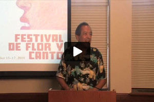 Billy Vela introduces the student poetry section, Festival de Flor y Canto, 2010