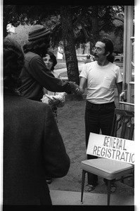 Juan Felipe Herrera greeting participants at the Festival de Flor y Canto, Los Angeles, 1973