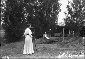 Lina Creux taking a photograph, Pretoria, South Africa, ca. 1896-1911