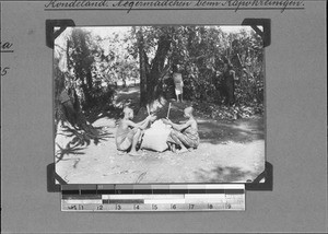 Konde girls cleaning kapok, Nyasa, Tanzania, 1929