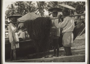 "Fishermen in Malabar carrying their nets