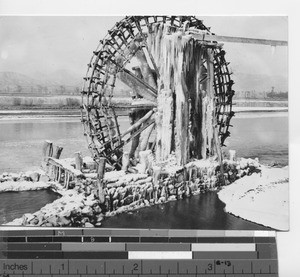 A water wheel in the winter in China