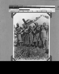 Chief Mpoli with horn players, Utengule, Tanzania