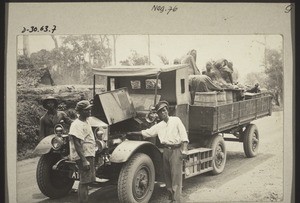 A lorry with barrels of cement