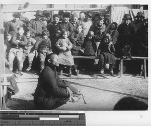 A story teller at Fushun, China, 1937