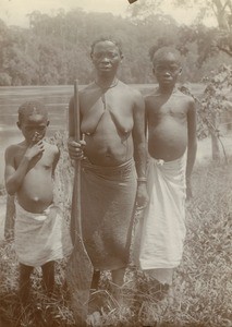 Woman with her children, in Gabon