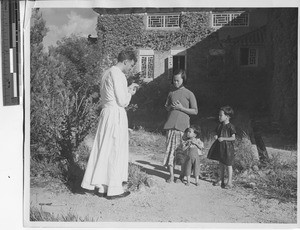 Fr. Carroll Quinn with the children of the Leprosarium at Jiangmen, China, 1947