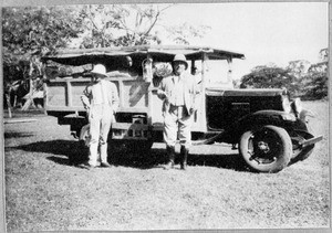 Europeans at a truck, Arusha, Tanzania, 1930