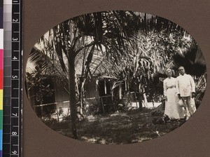 Missionary and wife standing outside mission house, Beru, Kiribati, 1913-1914