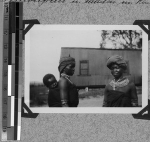 Tembu woman and girl with child in the baby-sling, South Africa East