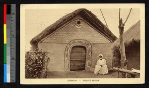 Bamoun mosque with seated man, Cameroon, ca.1928