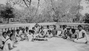 South Arcot, India. The Womens Station in Tiruvannamalai. Young women's meeting on the porch in