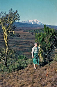 Missionary Nurse Ellen Margrethe Christensen with Mount Kilimanjaro in the background. (She ser