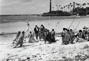 Historical reconstitution of the arrival of Fao, an evangelist, on Lifou in 1842 : arrival on the beach of Mou, welcomed by a group of dancers