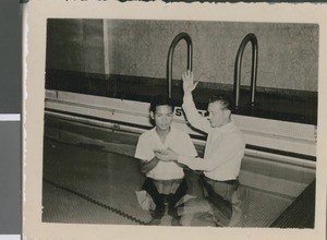 Melvin Harbison Baptizing Robert Chan, ca.1959-1960