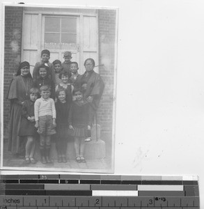 Maryknoll Sister with Primary class at Dalian, China