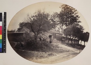 View of men outside Russian cemetery, Beijing, China, ca. 1861-1864