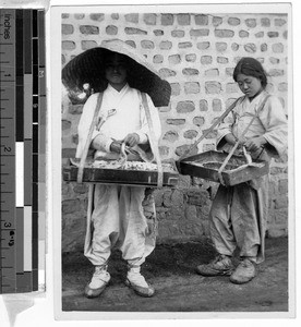 Two street vendors, Korea, 1930