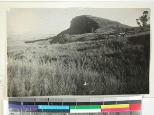 Passing a mountain top on the path to Mikoboke, Madagascar, 1936