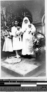 Maryknoll Sister and a St. Paul's Hospital nurse holding babies, Manila, Philippines, ca. 1920-1940