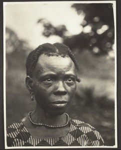 A christian woman in Bonakanda. A different hairstyle