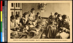 Orphans stitching clothing indoors, Canada, ca.1920-1940