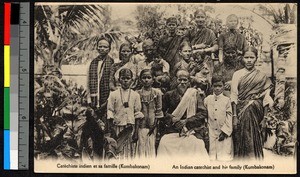 Local catechist sitting with family, India, ca.1920-1940