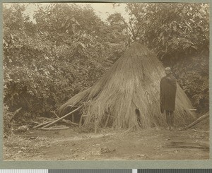 Young man at a meeting hut, Eastern province, Kenya, ca.1926
