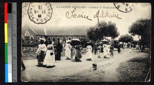 People departing from a Protestant church, Guinea, ca.1915