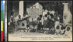 Orphaned students with their teacher, Kumbakonam, India, ca.1920-1940