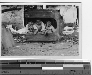 Three boys playing at the orphanage at Loting, China, 1937