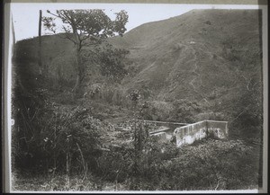 A tea house on the road from Honyen to Lenphin, destroyed by soldiers. When Rev. Schneider was robbed he lay here bound for three hours