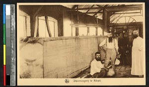 Men in a sawmill, Kikwit, Congo, ca.1920-1940