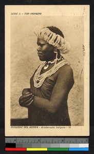 Woman wearing necklaces and ornate headdress, Kenya, ca.1920-1940