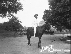 Henri Guye on horse, Antioka, Mozambique, ca. 1896-1911